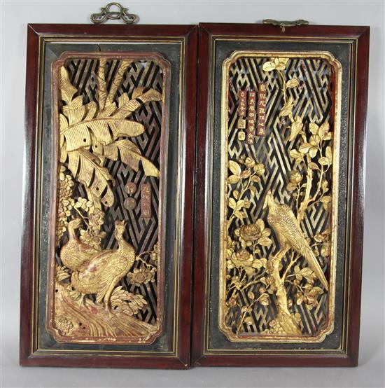 A pair of late 19th century Chinese gilt lacquered carved wood panels, 128 x 63cm